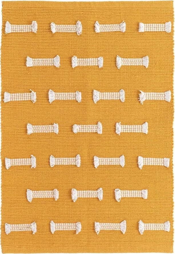 Okrově žlutý pratelný koberec 50x80 cm Juline – douceur d'intérieur Douceur d intérieur